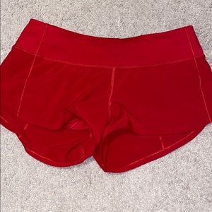 Red lululemon athletic shorts